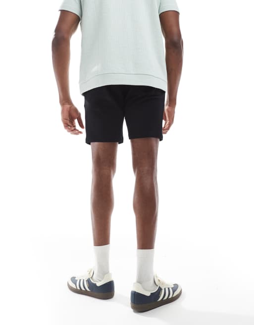 ASOS DESIGN jersey skinny shorts in black