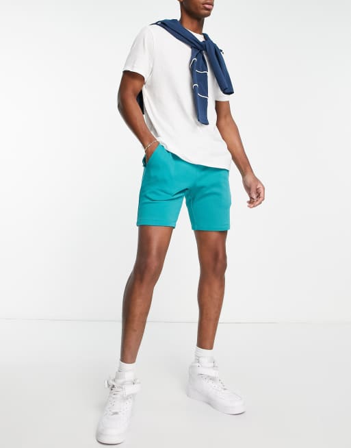 ASOS DESIGN jersey skinny shorts in green