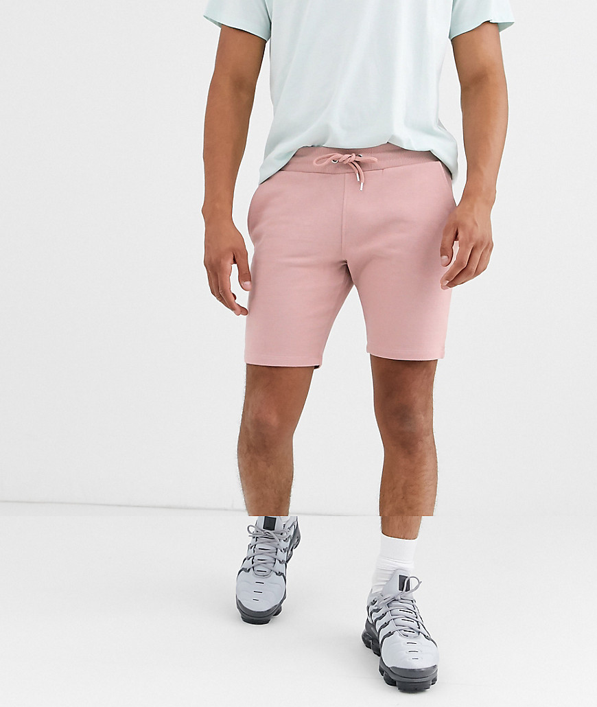 ASOS DESIGN jersey skinny shorts in pink