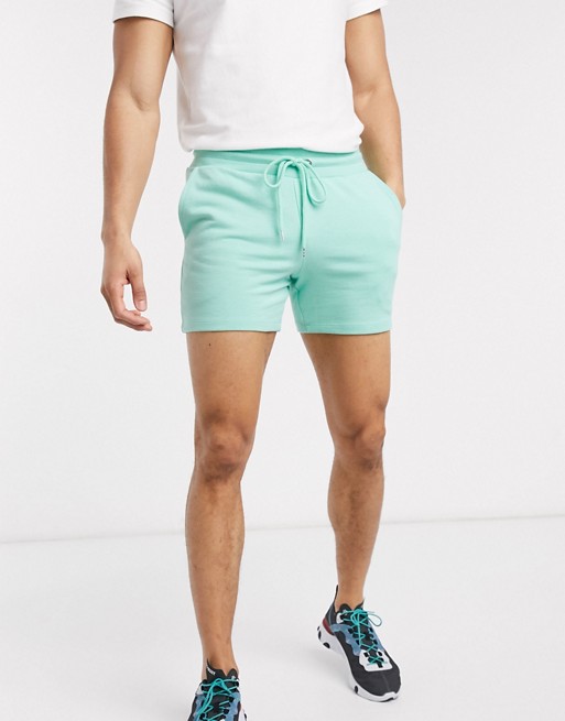 ASOS DESIGN jersey skinny shorts in shorter length in green