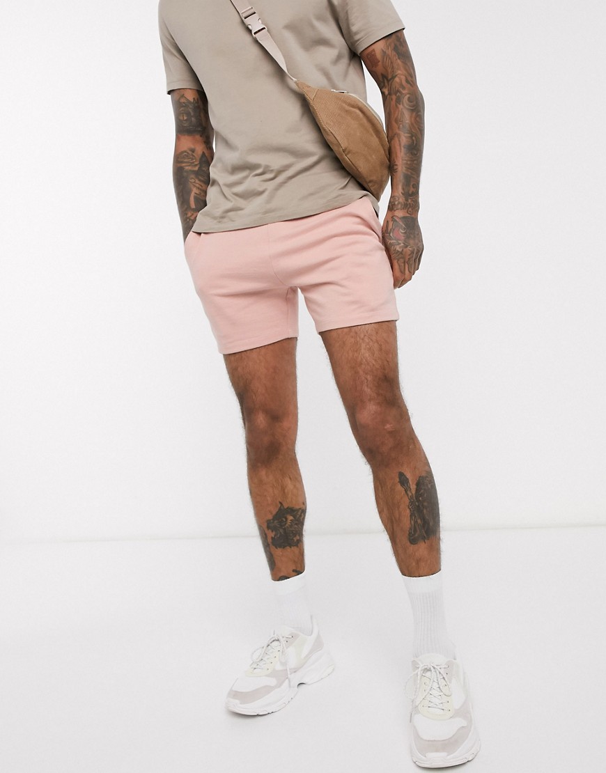 ASOS DESIGN jersey skinny shorts in shorter length in pink
