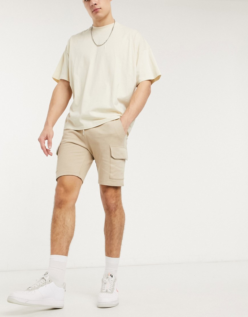 ASOS DESIGN jersey skinny shorts with cargo pockets in beige