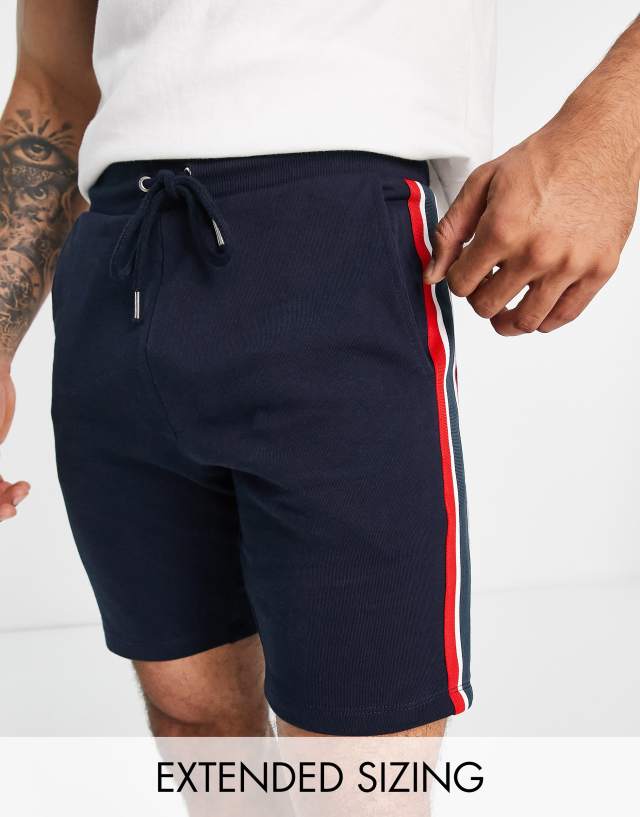 ASOS DESIGN jersey skinny shorts with knitted side stripe in navy