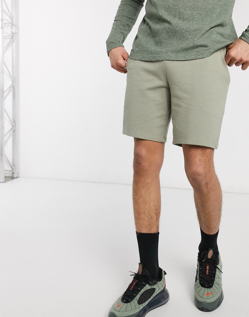 ASOS DESIGN jersey slim shorts in light khaki-Green