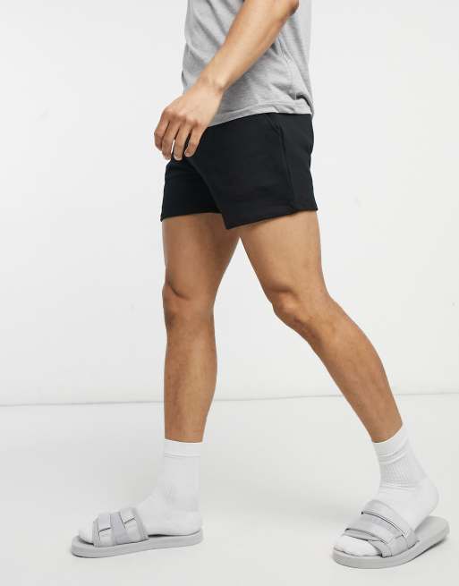 ASOS DESIGN shorter length slim shorts in washed black