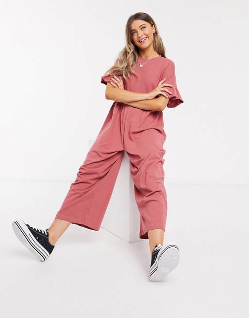 ASOS DESIGN lounge jersey smock jumpsuit with frill sleeve in rose