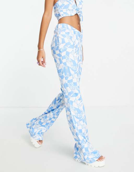 ASOS DESIGN kick flare pants in blue floral print