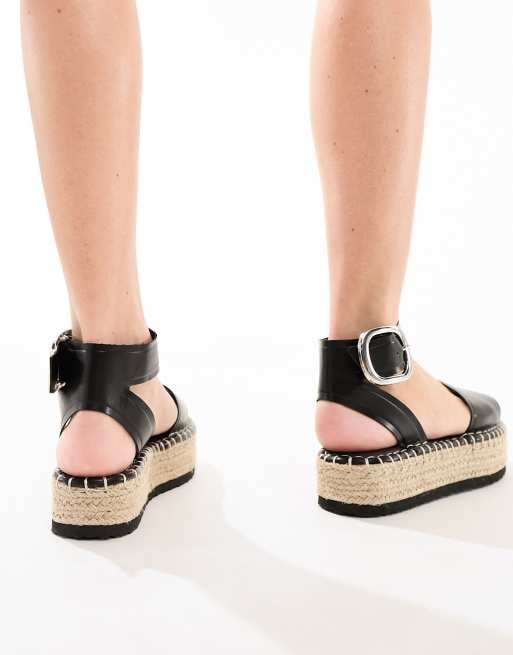 ASOS DESIGN Jinny espadrille with oval buckle in black