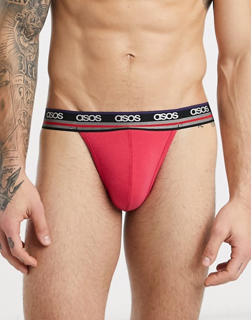 ASOS DESIGN jock strap in pink with branded stripe waistband
