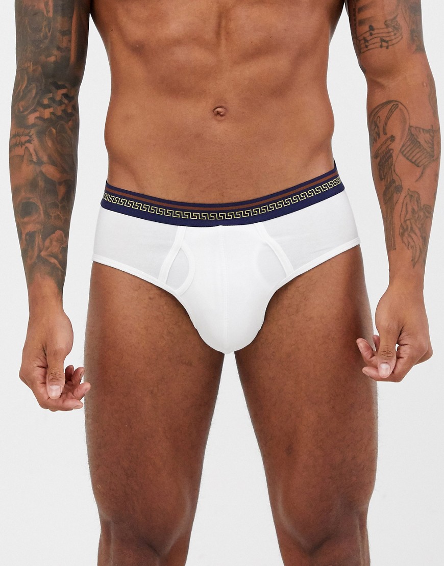 ASOS DESIGN jock strap in white organic cotton with patterned gold waistband