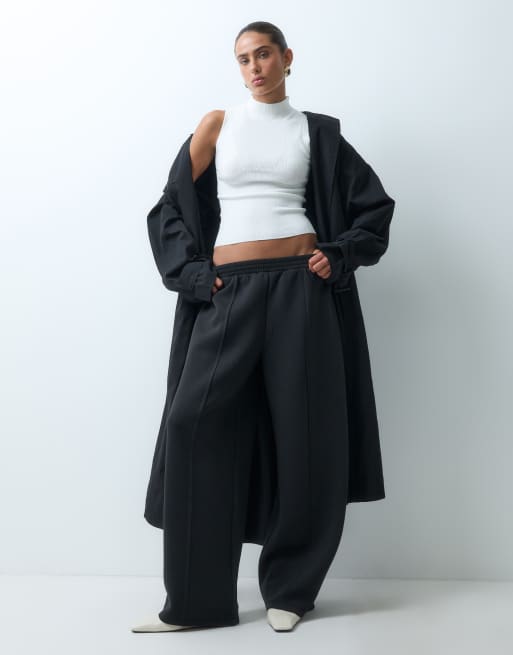 ASOS DESIGN jogger a gamba larga in tessuto effetto scuba con dettaglio a piega nero, 1 di 5