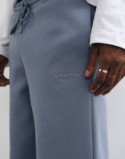 ASOS DESIGN jogger a gamba larga in tessuto scuba con ricamo blu, 3 di 5
