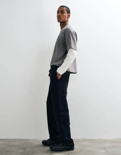 ASOS DESIGN jogger à jambes larges avec poches cargo superposées en noir délavé - view 1