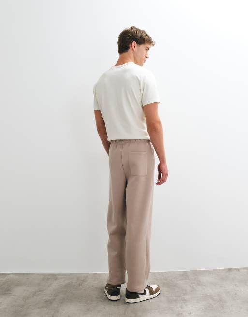ASOS DESIGN Jogger aus Scuba-ähnlichem Stoff mit lockerer, zulaufender Passform in Neutral, 5 von 5