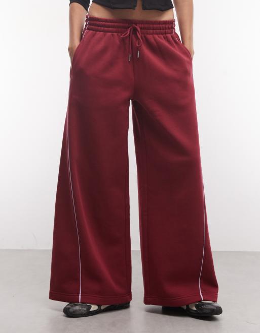 ASOS DESIGN jogger con pannelli a gamba extra ampia con dettagli piping in bordeaux e lilla, 2 di 5