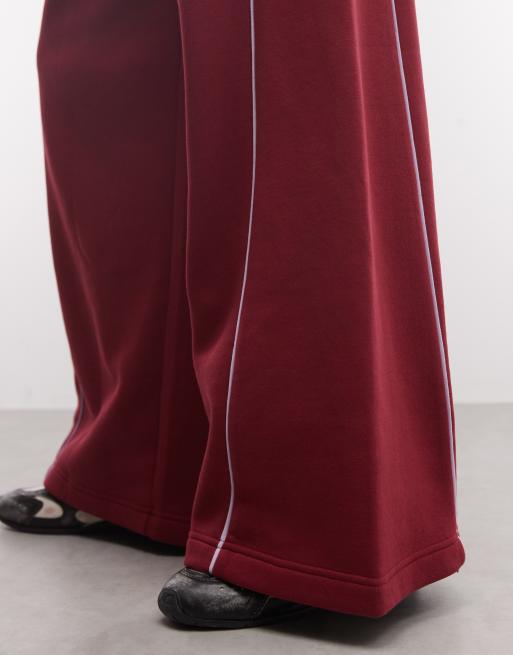 ASOS DESIGN jogger con pannelli a gamba extra ampia con dettagli piping in bordeaux e lilla, 4 di 5