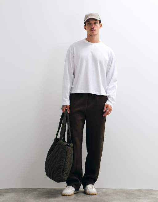 ASOS DESIGN jogger de pernera ancha con costura retorcida en tejido tipo scuba en marrón, 1 de 5