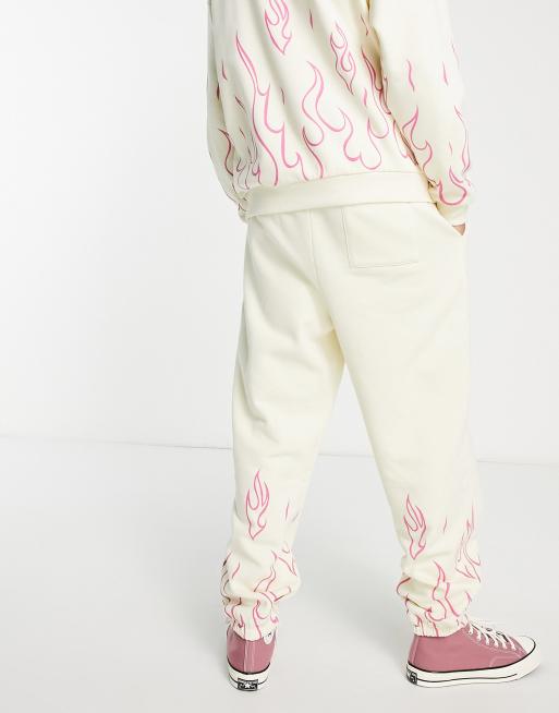 ASOS DESIGN - Jogger décontracté d’ensemble à imprimé flammes - Beige