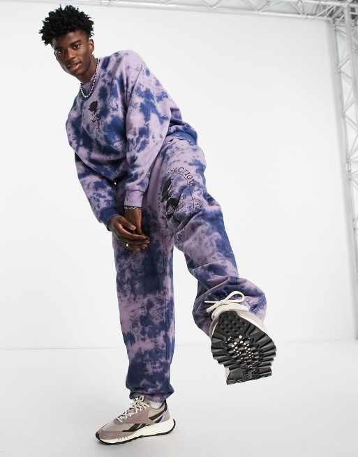 ASOS DESIGN - Jogger d'ensemble oversize effet tie-dye à imprimé rose - Violet