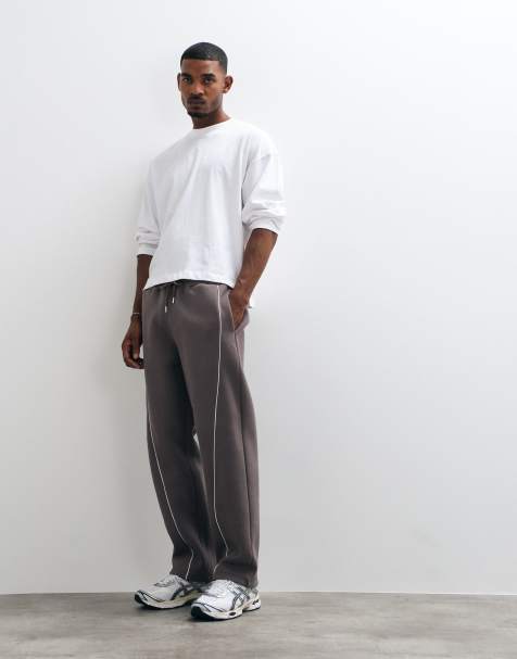 ASOS DESIGN Jogger mit geradem Bein und geschwungenen Paspeln in Piqué-Optik in Grau - view 1