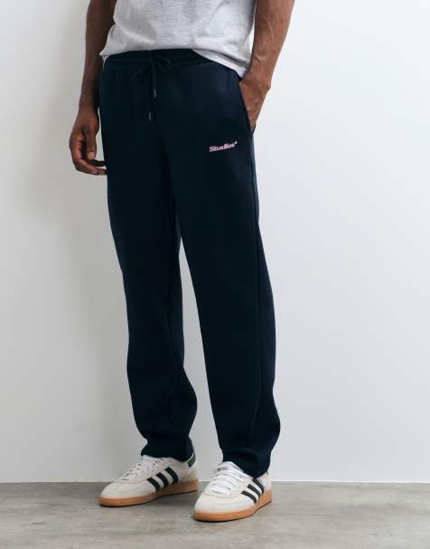 ASOS DESIGN Jogger mit geradem Schnitt und Pigmentdruck in Marineblau - view 1