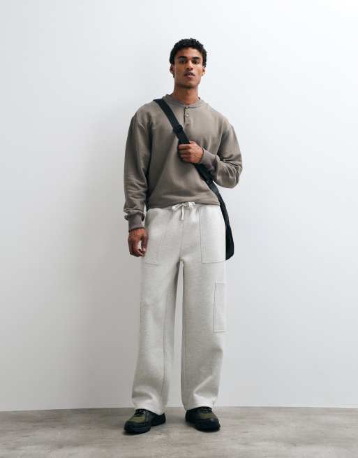ASOS DESIGN Jogger mit weitem Bein, aufgesetzten Taschen und Scuba-ähnlichem Stoff, 2 von 5