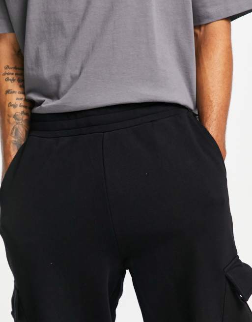 ASOS DESIGN - Jogger oversize à poches cargo - Noir, 4 de 4