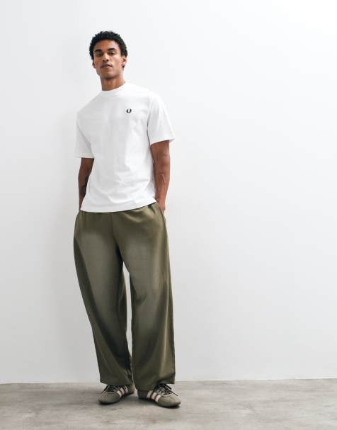 ASOS DESIGN jogger oversize ballon à plis et délavage spray en kaki - view 1