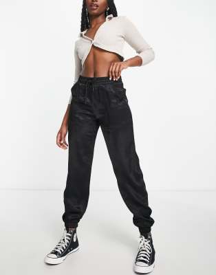 Pantalon De Jogging Victoria Beckham Noir Satiné à Rayures - Taille UK10/US6 - Neuf Sans étiquette