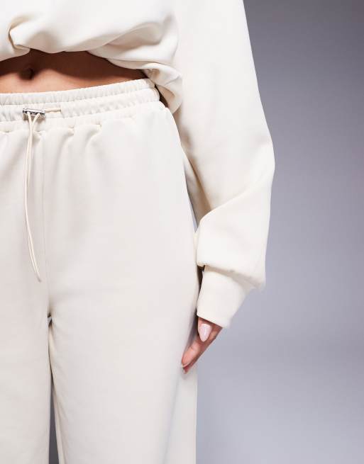 ASOS DESIGN jogger with bungee cord in ecru in scuba-style fabric, 4 of 5