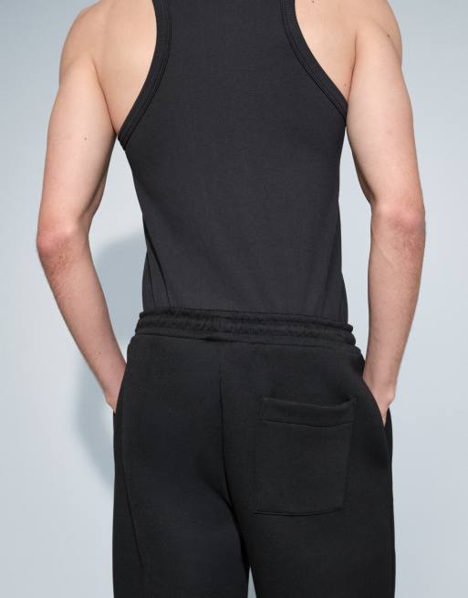 ASOS DESIGN - Joggers a fondo ampio in tessuto scuba nero con ricami, 3 di 7