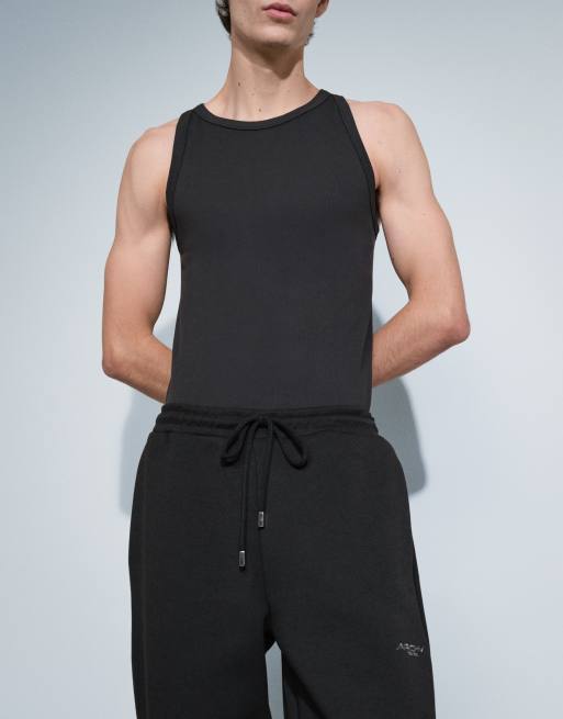 ASOS DESIGN - Joggers a fondo ampio in tessuto scuba nero con ricami, 4 di 7