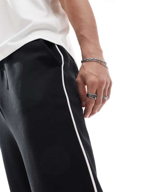 ASOS DESIGN - Joggers a fondo ampio neri con riga sul lato a contrasto, 4 di 6