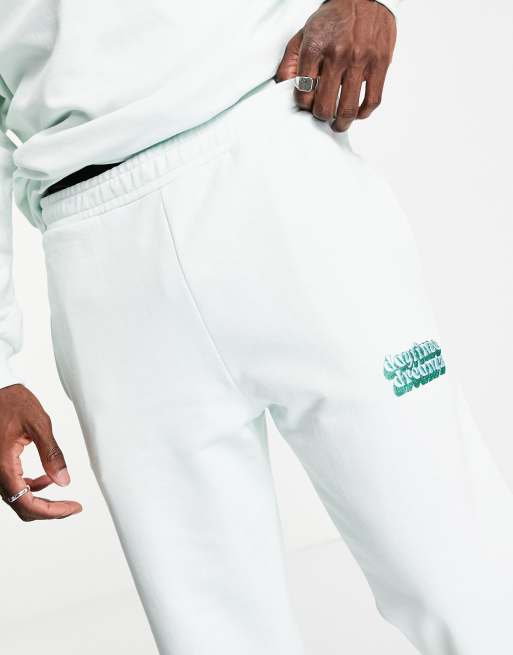 ASOS DESIGN - Joggers a zampa con stampa piccola di testo in coordinato, 3 di 4