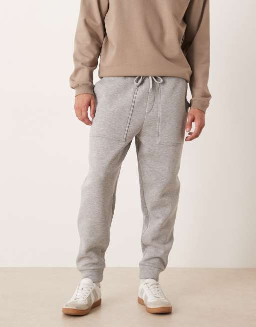 ASOS DESIGN - Joggers affusolati color grigio mélange con tasche in coordinato