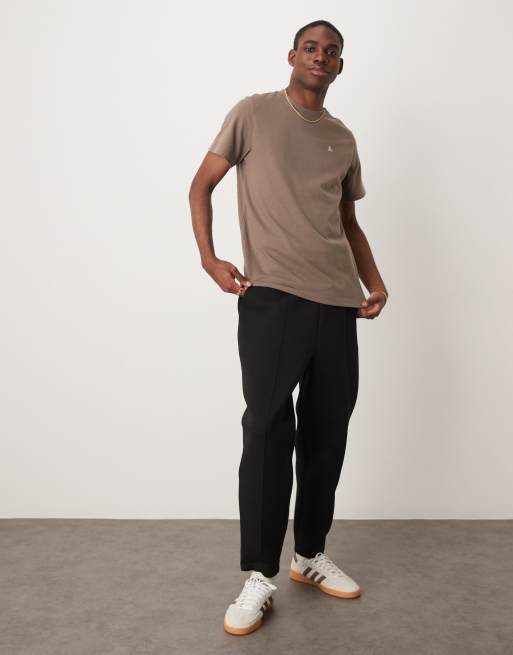 ASOS DESIGN - Joggers affusolati in tessuto scuba con pieghe neri