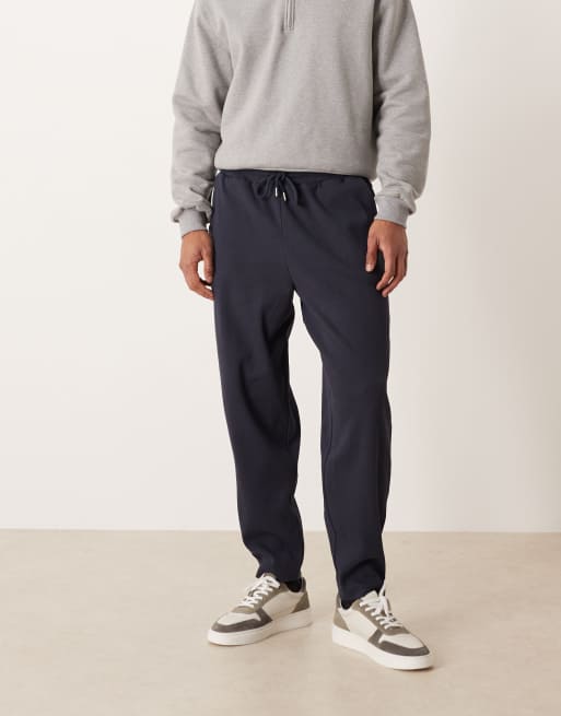 ASOS DESIGN - Joggers affusolati pesanti color blu navy a coste in coordinato