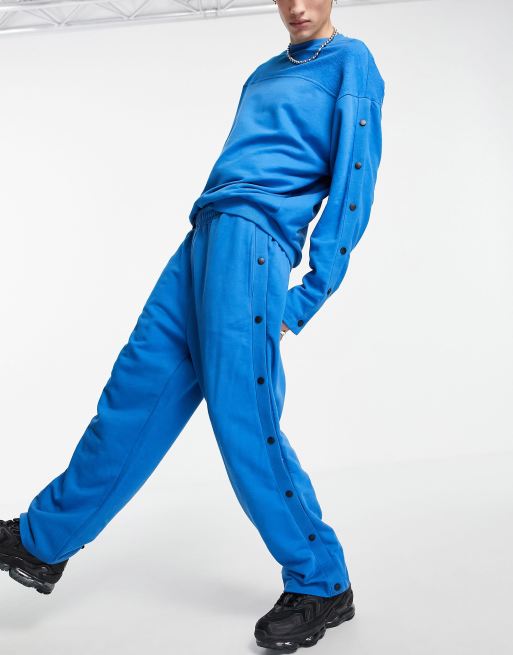ASOS DESIGN - Joggers ampi oversize blu con bottoni a pressione in coordinato