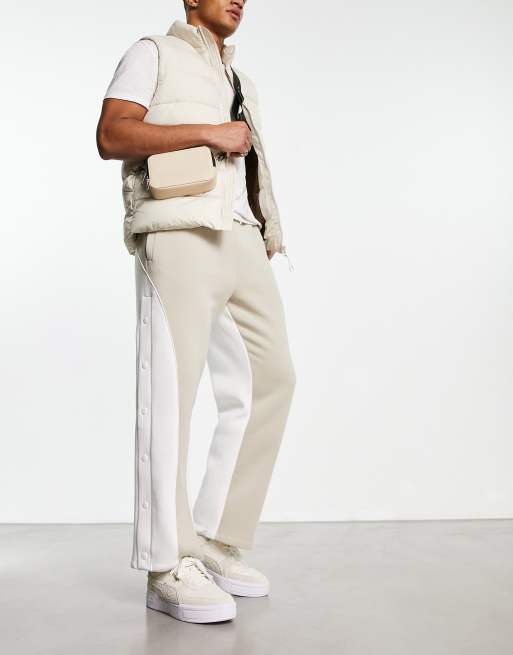 ASOS DESIGN - Joggers beige ampi con bottoni a pressione