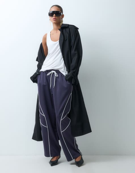 ASOS DESIGN - joggers deportivos con ribetes en contraste en azul marino - view 1