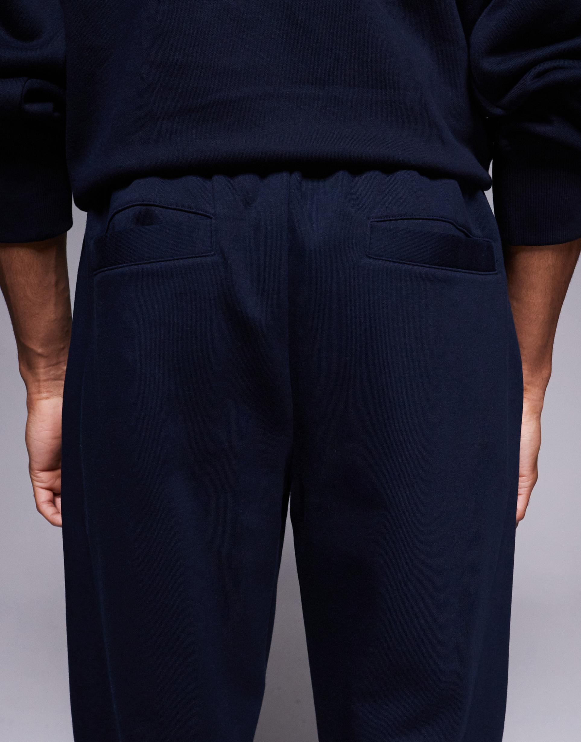 ASOS DESIGN - Joggers dritti blu navy con pieghe