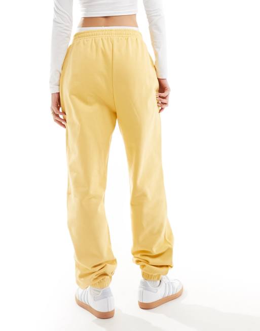 ASOS DESIGN - Joggers in felpa gialli con polsino, 5 di 5
