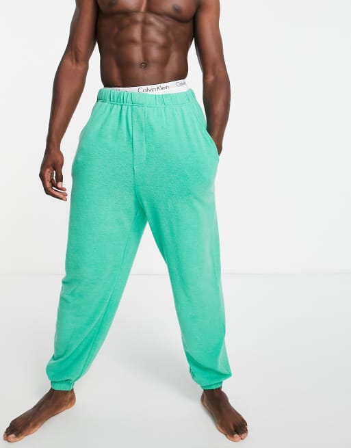 ASOS DESIGN - Joggers in maglia sintetica verde