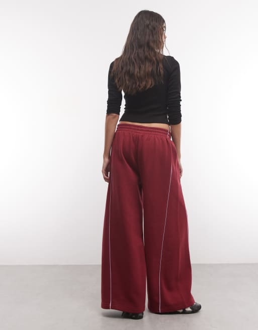 ASOS DESIGN joggers med paneler och extra vida ben med passepoaldetaljer i vinröd och lila, 5 av 5