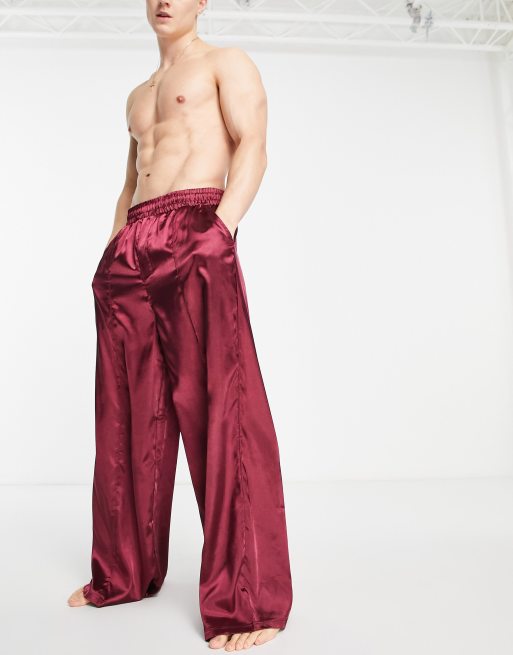 ASOS DESIGN - Joggers natalizi da casa in raso con pinces