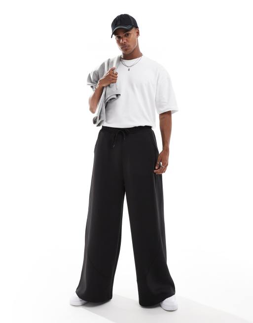 ASOS DESIGN - Joggers neri a fondo super ampio in tessuto scuba