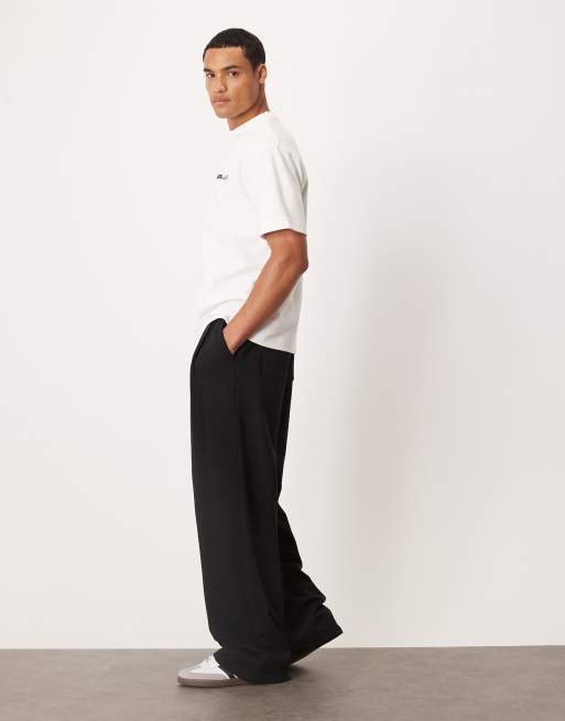 ASOS DESIGN - Joggers neri con fondo ampio e pieghe, 2 di 5
