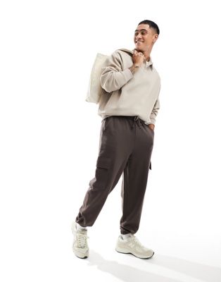 ASOS DESIGN oversized joggers with cargo pockets in brown - ASOS Price Checker