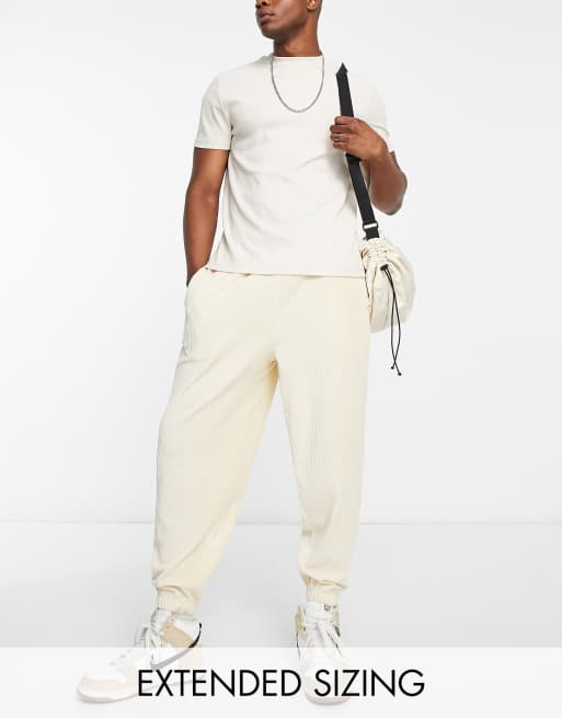 Joggers oversize in velour a coste beige Asos Uomo Abbigliamento Pantaloni e jeans Pantaloni Joggers 