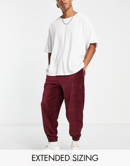 ASOS DESIGN - Joggers oversize in velour a coste bordeaux